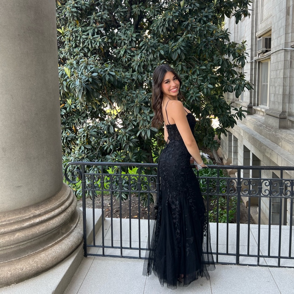 Lace fit and flare with a lace up back.